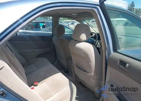 2003 Toyota Camry Le z USA, uszkodzony, nr VIN JTDBE32K130182354